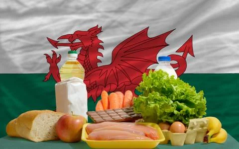 Basic food groceries in front of wales national flag 写真素材