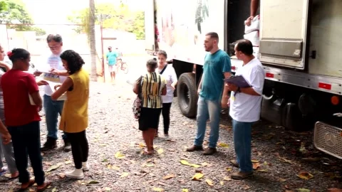 Basic Food Kit Distribution in Planaltina Goias Stock Footage 254505840