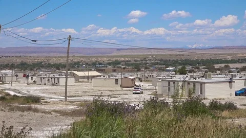 Basic government houses for American Indian natives near Shiprock, new Mexico. Stock Footage