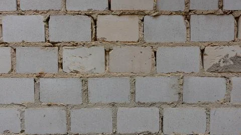 Basic Gray Concrete Block Wall Showing Various Textures and Imperfections Stock Photos