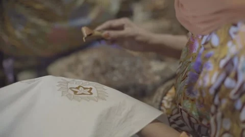 Basic hand painting melted wax on white blank fabric Stock Footage 155388414