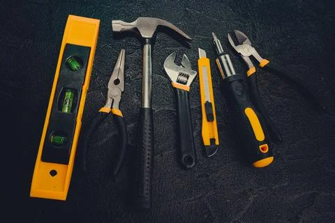 Basic Home Repair Tools On Black Background Stock Photos