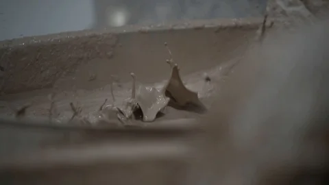 The basic ingredients that go into a finished tile are clays, sands and Stock Footage 95784150