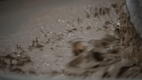 The basic ingredients that go into a finished tile are clays, sands and Stock Footage 95784155