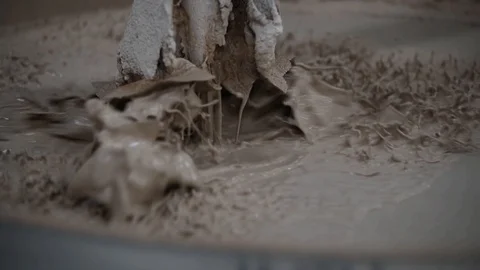 The basic ingredients that go into a finished tile are clays, sands and Stock Footage 95784157