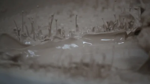 The basic ingredients that go into a finished tile are clays, sands and Stock Footage 95787996