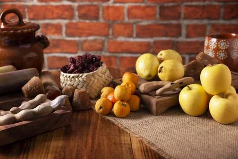 Basic ingredients to prepare Mexican fruit punch, a hot drink traditionally c Stock Photos