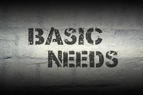 Basic needs gr basic needs stencil print on the grunge white brick wall; s... 写真素材