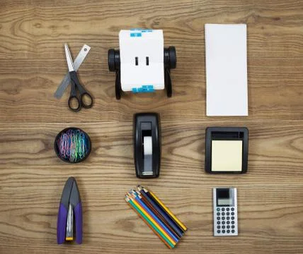 Basic office supplies on aged wood Stock-Fotos