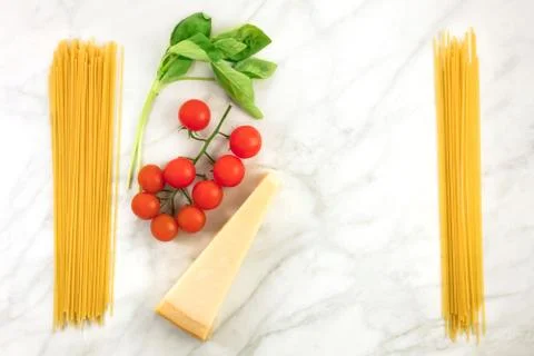Basic pasta ingredients, including spaghetti and cheese 写真素材
