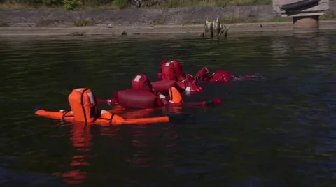 Basic safety training with Survival suits Stock Footage 54651345
