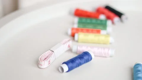 Basic sewing tools with colorful threads and tape for beginner's workshop 스톡 사진