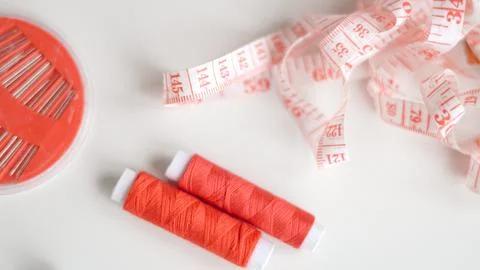 Basic sewing tools with colorful threads and tape for beginner's workshop Stock Photos