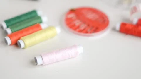 Basic sewing tools with colorful threads and tape for beginner's workshop Stock Photos