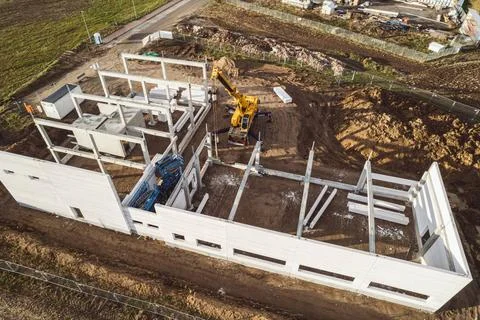 The basic structure of an industrial building is erected on a construction... Stock Photos
