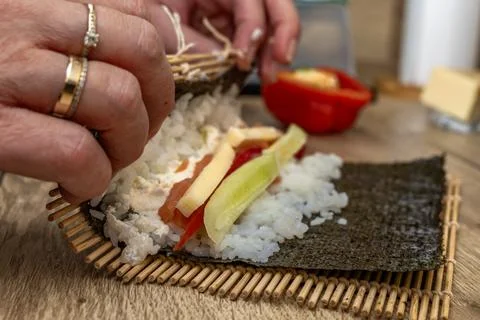 Basic sushi ingredients short-grain rice, rice vinegar, nori seaweed, and f.. Stock Photos