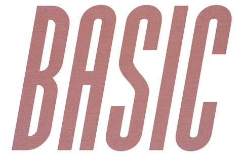 BASIC word with terracotta colored fabric texture on white background Stock Photos