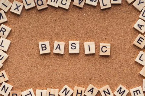 BASIC word written on wood block. BASIC text on wooden table. 库存照片