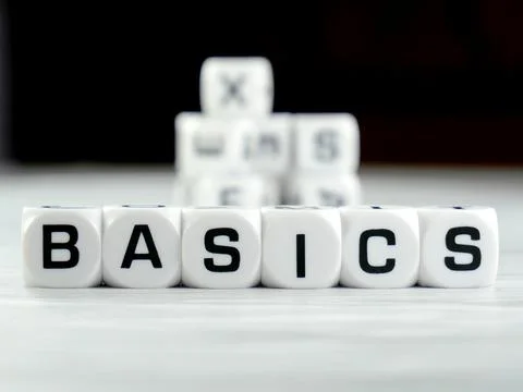 Basics wording or text on white dice with white background.Copy space and b.. Stock Photos