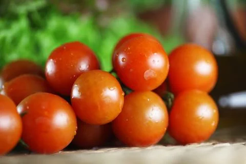 Basil and cherry tomatoes Stock Photos