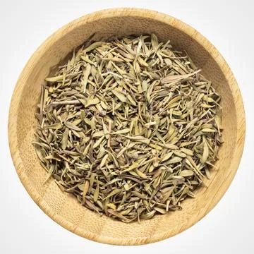 Basil dried herb - isolated small wooden sidedish bowl, top view Stock Photos