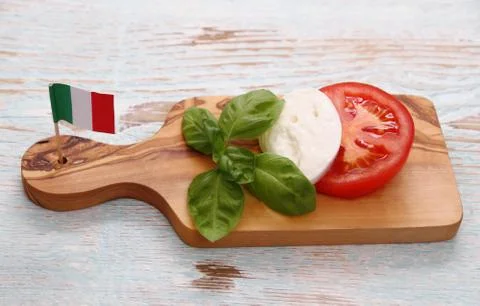 Basil leaf, mozzarella cheese and tomato slice Stock Photos