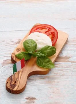 Basil leaf, mozzarella cheese, tomato slice, italy flag Stock Photos