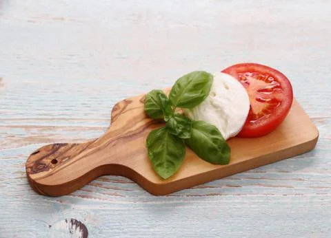 Basil leaf, mozzarella cheese, tomato slice Stock Photos
