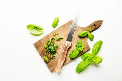 Basil leaves on white. Stock Photos
