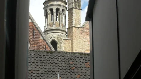 Basilica of the Holy Blood's towers seen from a street in Bruges Video stock 59667565