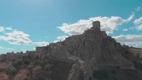 Basilicata, pan from below of old Craco Stock Footage 259649636
