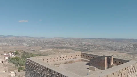 Basilicata, view of old tower Craco and Calanchi Stock Footage 259650000