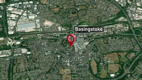 Basingstoke City Map Zoom (UK) from Space to Earth Video stock 243284064