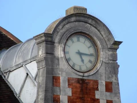 Basingstoke Station Clock showing quarter past five Stock Photos