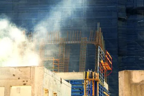 The basis of a building under construction made of metal reinforcement at a c Stock Photos