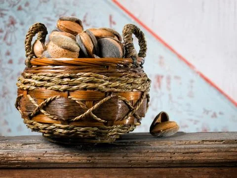Basket of almonds Stock Photos
