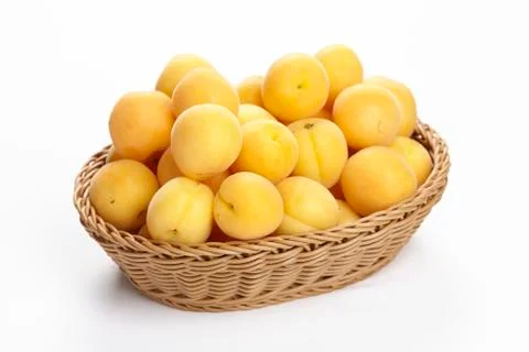 Basket of apricots Stock Photos