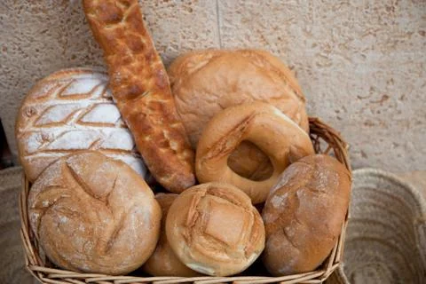 Basket of assorted bread rolls and bagels Stock Photos