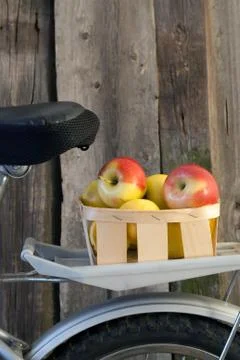 Basket by bicycle Stock Photos
