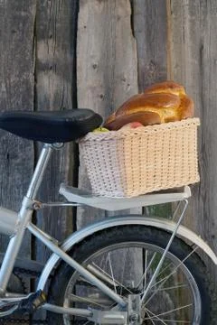Basket by bicycle Stock Photos