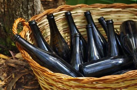Basket with bottles Stock Photos