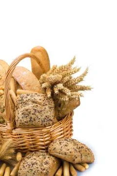 Basket with a bread assortment isolated on white Stock Photos