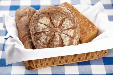 Basket of bread Stock Photos