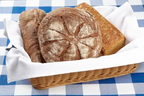 Basket of bread Stock Photos