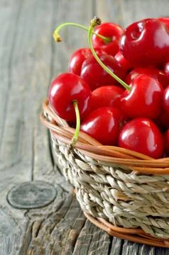 Basket of cherries Stock Photos