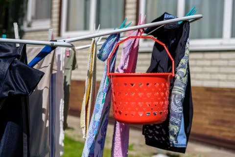 Basket for clothespins. Stock Photos