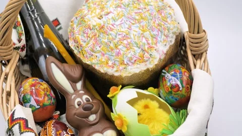 Basket decorated with Easter cake, chocolate rabbit, eggs and chicken Stock Footage 276312907