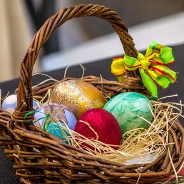 Basket with decorated eggs for Easter Stock Photos