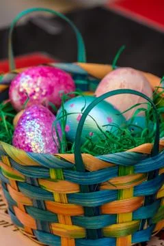 Basket with decorated eggs for Easter Stock Photos