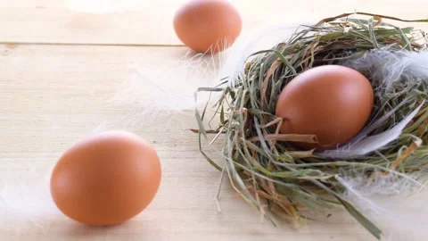 Basket easter decoration: natural colour eggs in basket with spring tulips Stock Footage 148914273